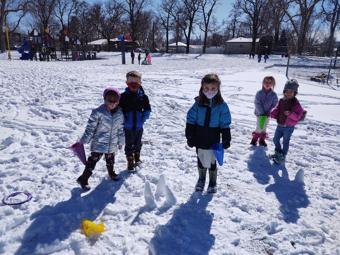 Group of students outside in the snow